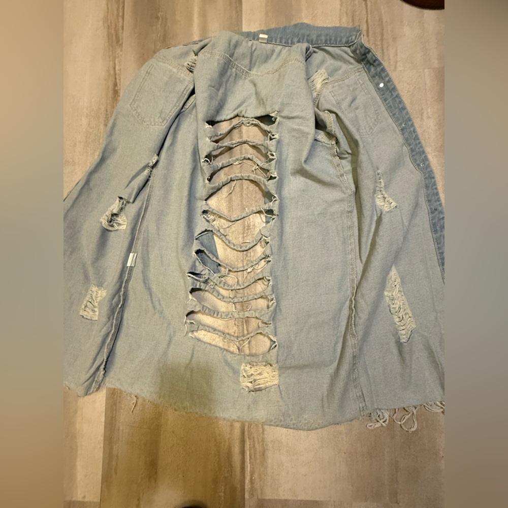 Women's Distressed Light Blue Denim Jacket - Picture 8 of 9
